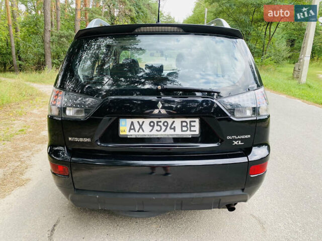 Чорний Міцубісі Аутлендер, об'ємом двигуна 2.36 л та пробігом 225 тис. км за 7900 $, фото 5 на Automoto.ua
