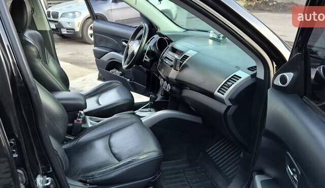 Чорний Міцубісі Аутлендер, об'ємом двигуна 2.4 л та пробігом 230 тис. км за 9700 $, фото 8 на Automoto.ua