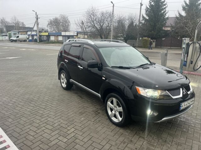 Чорний Міцубісі Аутлендер, об'ємом двигуна 3 л та пробігом 220 тис. км за 8300 $, фото 1 на Automoto.ua