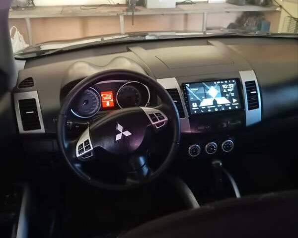 Черный Мицубиси Аутлендер, объемом двигателя 2.35 л и пробегом 245 тыс. км за 8000 $, фото 8 на Automoto.ua