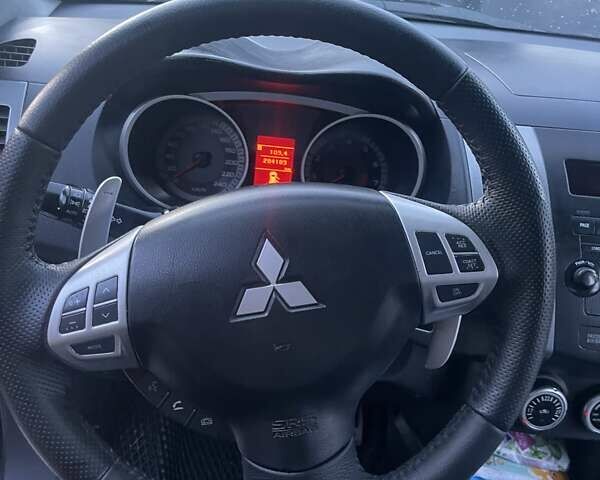 Черный Мицубиси Аутлендер, объемом двигателя 2.4 л и пробегом 290 тыс. км за 9500 $, фото 19 на Automoto.ua