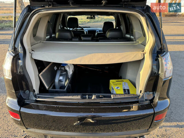 Чорний Міцубісі Аутлендер, об'ємом двигуна 3 л та пробігом 150 тис. км за 9499 $, фото 7 на Automoto.ua