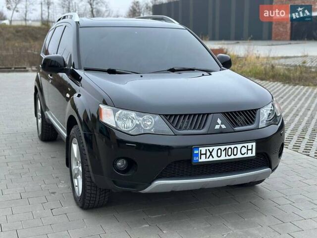 Черный Мицубиси Аутлендер, объемом двигателя 3 л и пробегом 248 тыс. км за 9800 $, фото 3 на Automoto.ua