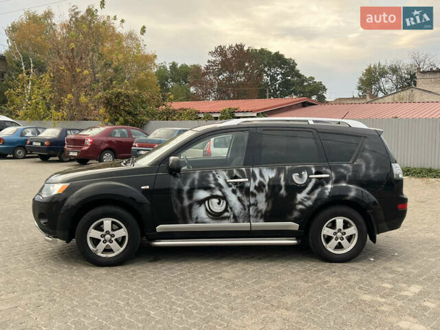 Черный Мицубиси Аутлендер, объемом двигателя 2.4 л и пробегом 230 тыс. км за 6650 $, фото 7 на Automoto.ua