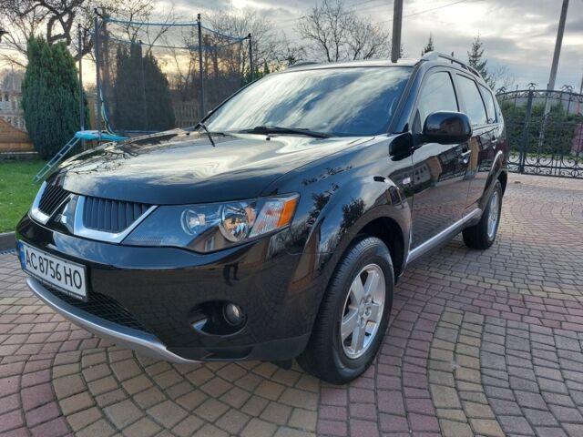 Черный Мицубиси Аутлендер, объемом двигателя 2 л и пробегом 249 тыс. км за 8750 $, фото 2 на Automoto.ua