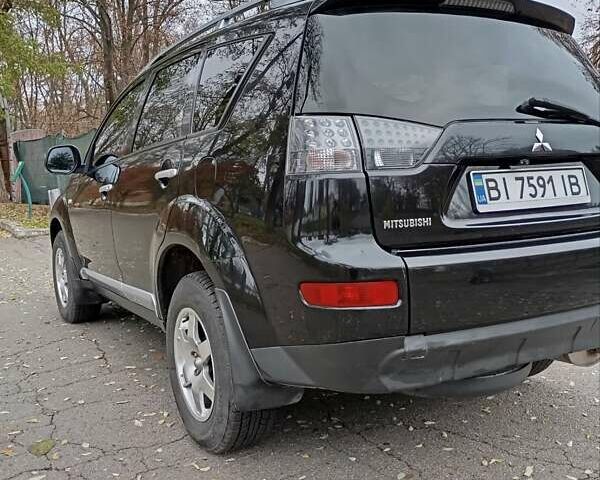 Чорний Міцубісі Аутлендер, об'ємом двигуна 2.36 л та пробігом 265 тис. км за 8800 $, фото 16 на Automoto.ua