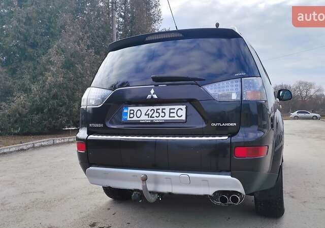 Чорний Міцубісі Аутлендер, об'ємом двигуна 2.2 л та пробігом 275 тис. км за 9900 $, фото 5 на Automoto.ua