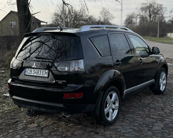 Чорний Міцубісі Аутлендер, об'ємом двигуна 2.36 л та пробігом 293 тис. км за 7900 $, фото 4 на Automoto.ua