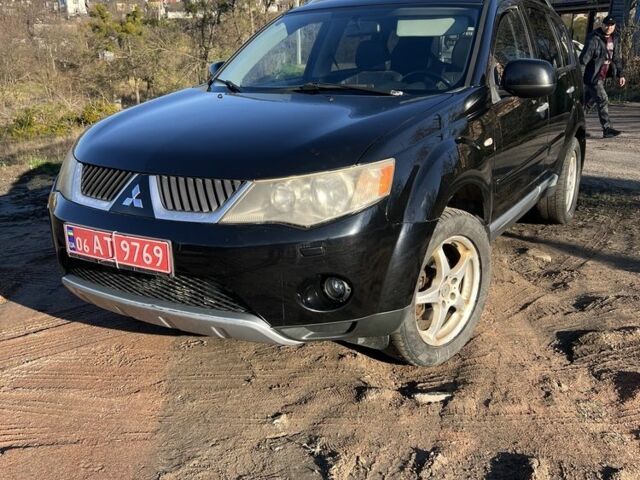 Черный Мицубиси Аутлендер, объемом двигателя 2 л и пробегом 247 тыс. км за 4600 $, фото 8 на Automoto.ua