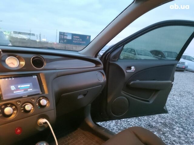 Черный Мицубиси Аутлендер, объемом двигателя 2 л и пробегом 271 тыс. км за 6940 $, фото 28 на Automoto.ua