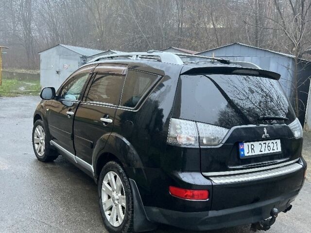 Чорний Міцубісі Аутлендер, об'ємом двигуна 2 л та пробігом 330 тис. км за 4900 $, фото 4 на Automoto.ua
