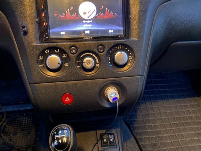 Чорний Міцубісі Аутлендер, об'ємом двигуна 2 л та пробігом 271 тис. км за 6799 $, фото 8 на Automoto.ua