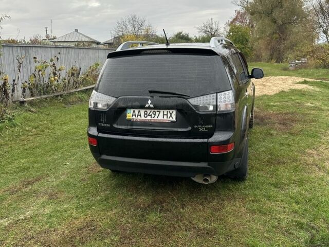 Чорний Міцубісі Аутлендер, об'ємом двигуна 2.4 л та пробігом 186 тис. км за 8700 $, фото 7 на Automoto.ua