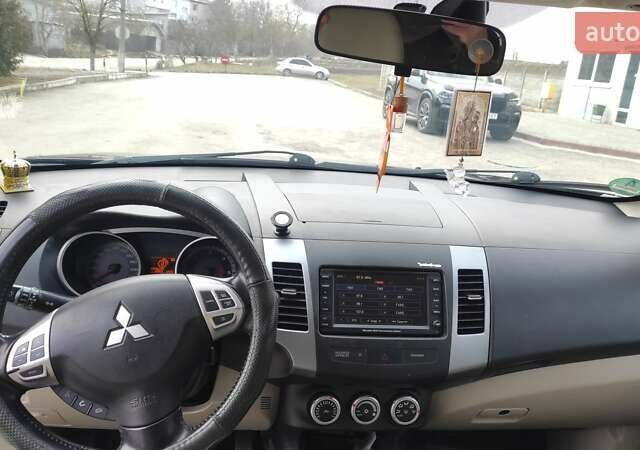 Чорний Міцубісі Аутлендер, об'ємом двигуна 2.2 л та пробігом 275 тис. км за 9900 $, фото 13 на Automoto.ua