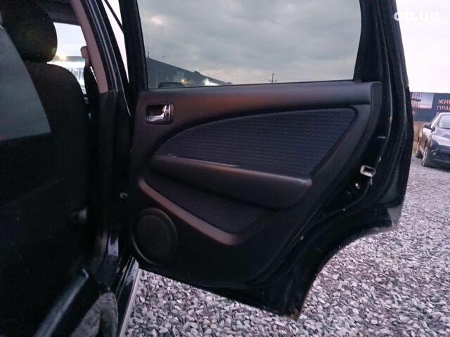 Черный Мицубиси Аутлендер, объемом двигателя 2 л и пробегом 271 тыс. км за 6940 $, фото 18 на Automoto.ua