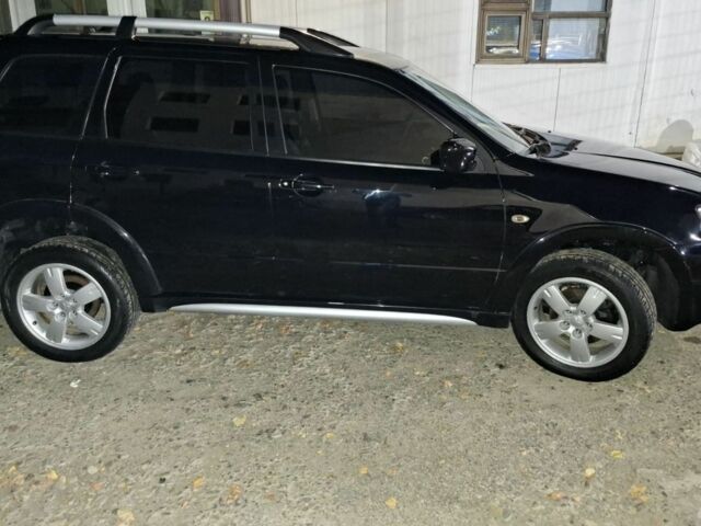 Чорний Міцубісі Аутлендер, об'ємом двигуна 2 л та пробігом 117 тис. км за 7900 $, фото 2 на Automoto.ua