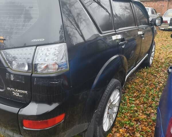 Чорний Міцубісі Аутлендер, об'ємом двигуна 2.4 л та пробігом 242 тис. км за 3400 $, фото 9 на Automoto.ua