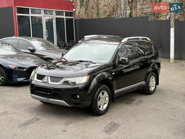Черный Мицубиси Аутлендер, объемом двигателя 2.4 л и пробегом 185 тыс. км за 7900 $, фото 5 на Automoto.ua