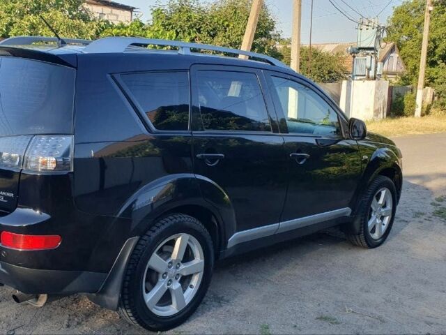 Чорний Міцубісі Аутлендер, об'ємом двигуна 2.4 л та пробігом 325 тис. км за 7500 $, фото 12 на Automoto.ua