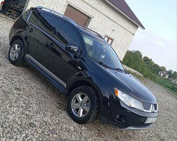 Черный Мицубиси Аутлендер, объемом двигателя 2.36 л и пробегом 203 тыс. км за 9200 $, фото 10 на Automoto.ua