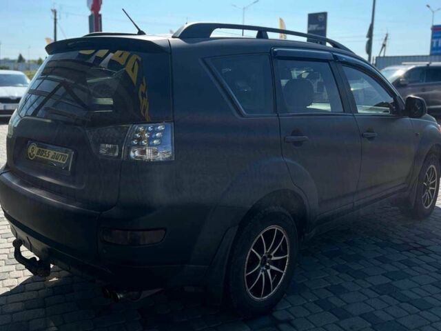 Черный Мицубиси Аутлендер, объемом двигателя 3 л и пробегом 308 тыс. км за 7600 $, фото 6 на Automoto.ua