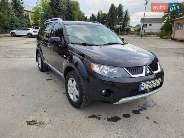 Чорний Міцубісі Аутлендер, об'ємом двигуна 2.4 л та пробігом 205 тис. км за 8400 $, фото 11 на Automoto.ua