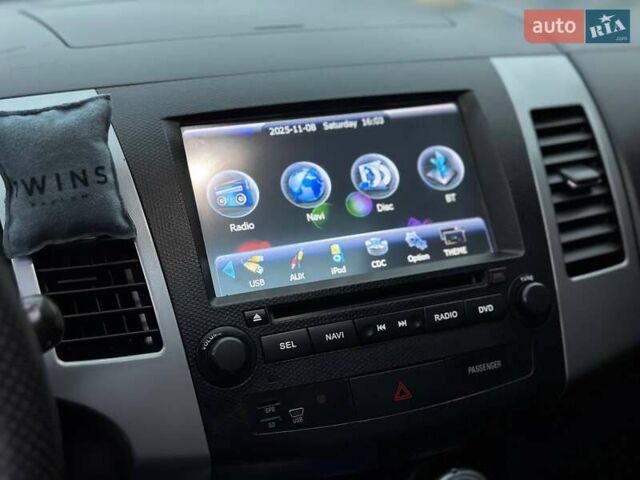 Черный Мицубиси Аутлендер, объемом двигателя 3 л и пробегом 248 тыс. км за 9800 $, фото 29 на Automoto.ua