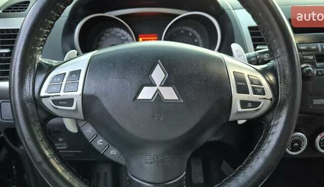Чорний Міцубісі Аутлендер, об'ємом двигуна 2.4 л та пробігом 230 тис. км за 9700 $, фото 18 на Automoto.ua