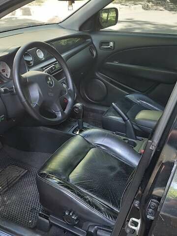 Черный Мицубиси Аутлендер, объемом двигателя 2.4 л и пробегом 150 тыс. км за 6300 $, фото 5 на Automoto.ua