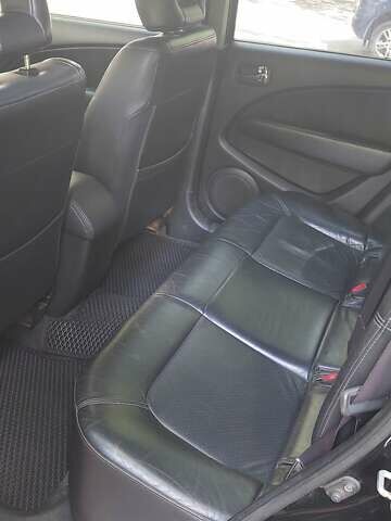 Черный Мицубиси Аутлендер, объемом двигателя 2.4 л и пробегом 150 тыс. км за 6300 $, фото 4 на Automoto.ua