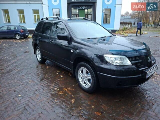 Чорний Міцубісі Аутлендер, об'ємом двигуна 2 л та пробігом 191 тис. км за 7100 $, фото 1 на Automoto.ua