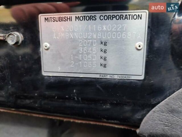 Міцубісі Аутлендер 2008 у Івано-Франківську на Automoto.ua Чорний Міцубісі Аутлендер, об'ємом двигуна 2 л та пробігом 128 тис. км за 7000 $, фото 2 на Automoto.ua