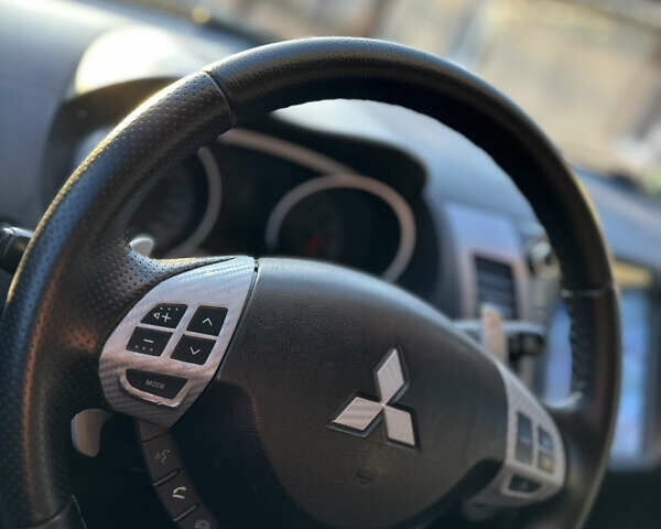 Черный Мицубиси Аутлендер, объемом двигателя 2.36 л и пробегом 253 тыс. км за 9600 $, фото 18 на Automoto.ua