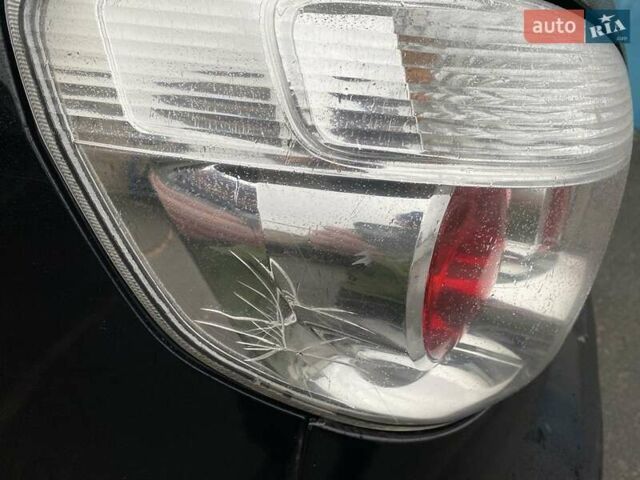 Черный Мицубиси Аутлендер, объемом двигателя 2 л и пробегом 306 тыс. км за 6500 $, фото 20 на Automoto.ua