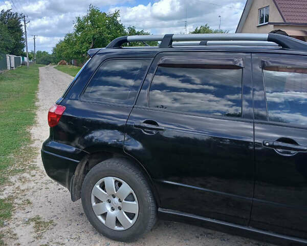 Чорний Міцубісі Аутлендер, об'ємом двигуна 2 л та пробігом 161 тис. км за 7499 $, фото 9 на Automoto.ua