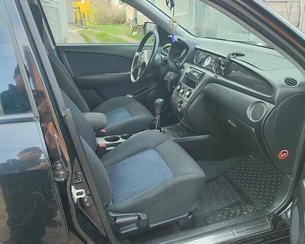 Міцубісі Аутлендер 2008 у Івано-Франківську на Automoto.ua Чорний Міцубісі Аутлендер, об'ємом двигуна 2 л та пробігом 128 тис. км за 7000 $, фото 1 на Automoto.ua