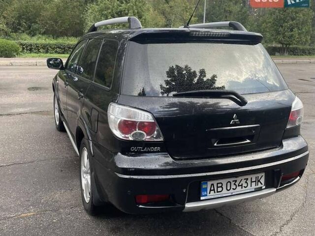 Чорний Міцубісі Аутлендер, об'ємом двигуна 2.38 л та пробігом 249 тис. км за 6100 $, фото 5 на Automoto.ua