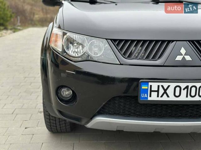 Черный Мицубиси Аутлендер, объемом двигателя 3 л и пробегом 248 тыс. км за 9800 $, фото 6 на Automoto.ua