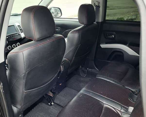 Чорний Міцубісі Аутлендер, об'ємом двигуна 2.4 л та пробігом 205 тис. км за 8400 $, фото 18 на Automoto.ua