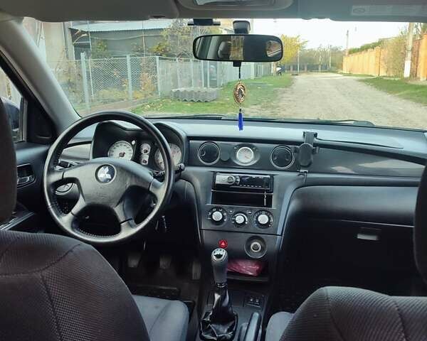 Міцубісі Аутлендер 2008 у Івано-Франківську на Automoto.ua Чорний Міцубісі Аутлендер, об'ємом двигуна 2 л та пробігом 128 тис. км за 7000 $, фото 8 на Automoto.ua