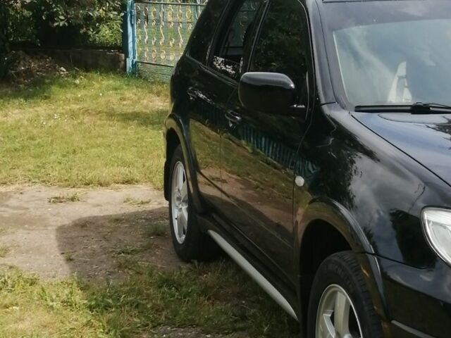 Чорний Міцубісі Аутлендер, об'ємом двигуна 2 л та пробігом 208 тис. км за 6700 $, фото 6 на Automoto.ua