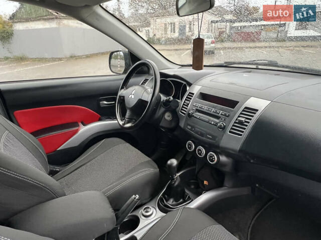 Міцубісі Аутлендер 2008 у Кременчуге на Automoto.ua Чорний Міцубісі Аутлендер, об'ємом двигуна 2.4 л та пробігом 230 тис. км за 6650 $, фото 51 на Automoto.ua