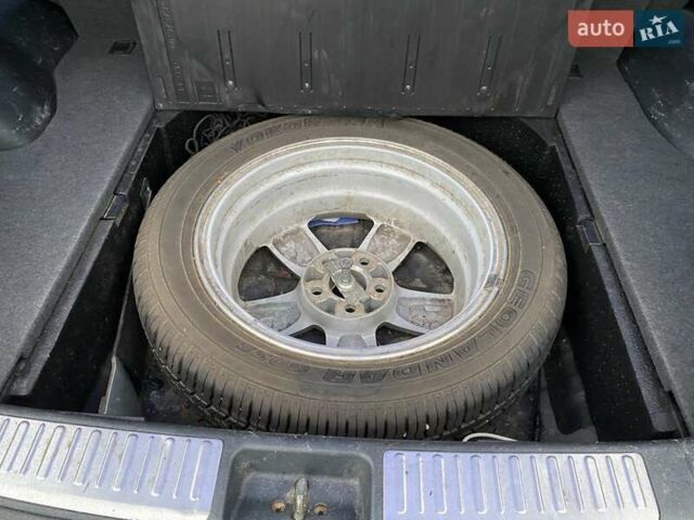 Черный Мицубиси Аутлендер, объемом двигателя 2 л и пробегом 306 тыс. км за 6500 $, фото 12 на Automoto.ua