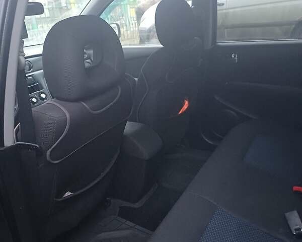 Черный Мицубиси Аутлендер, объемом двигателя 2.4 л и пробегом 270 тыс. км за 6700 $, фото 5 на Automoto.ua