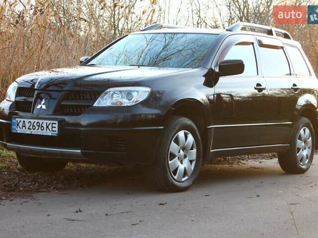 Черный Мицубиси Аутлендер, объемом двигателя 2 л и пробегом 189 тыс. км за 7200 $, фото 10 на Automoto.ua