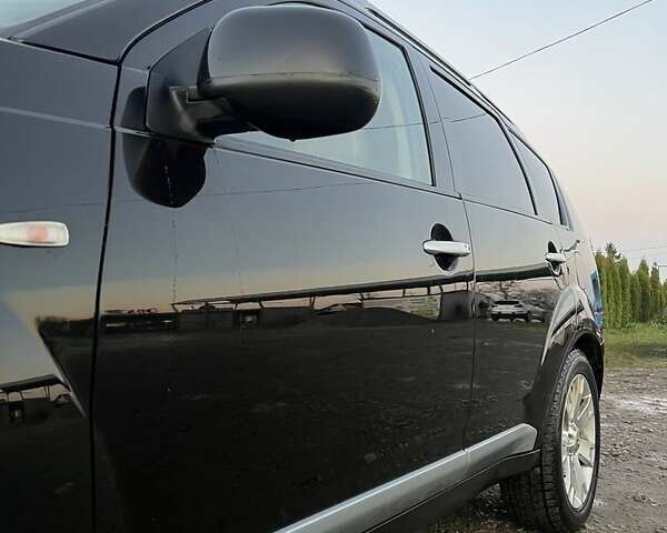 Черный Мицубиси Аутлендер, объемом двигателя 2.2 л и пробегом 310 тыс. км за 9700 $, фото 2 на Automoto.ua