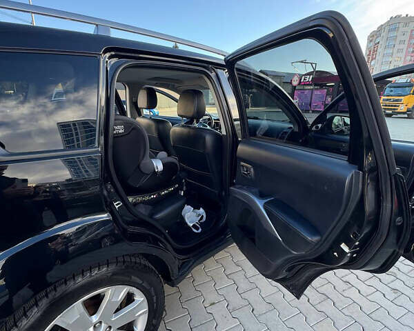 Черный Мицубиси Аутлендер, объемом двигателя 1.97 л и пробегом 202 тыс. км за 9700 $, фото 5 на Automoto.ua