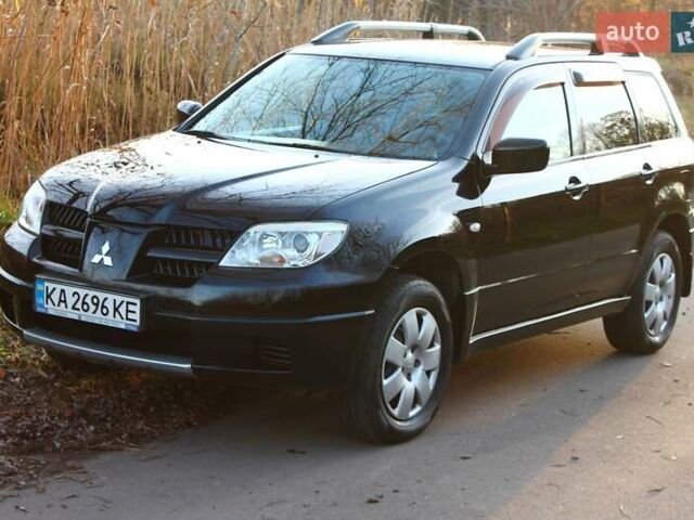 Черный Мицубиси Аутлендер, объемом двигателя 2 л и пробегом 189 тыс. км за 7200 $, фото 30 на Automoto.ua