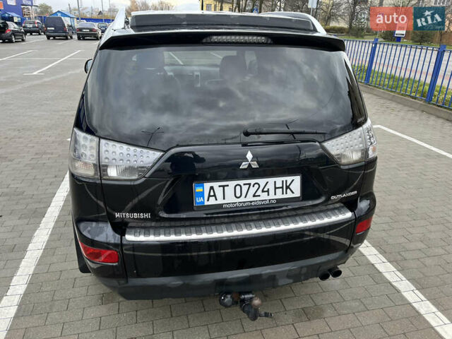 Черный Мицубиси Аутлендер, объемом двигателя 1.97 л и пробегом 244 тыс. км за 8800 $, фото 4 на Automoto.ua