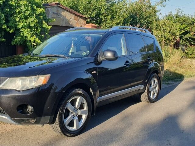 Чорний Міцубісі Аутлендер, об'ємом двигуна 2.4 л та пробігом 325 тис. км за 7500 $, фото 16 на Automoto.ua